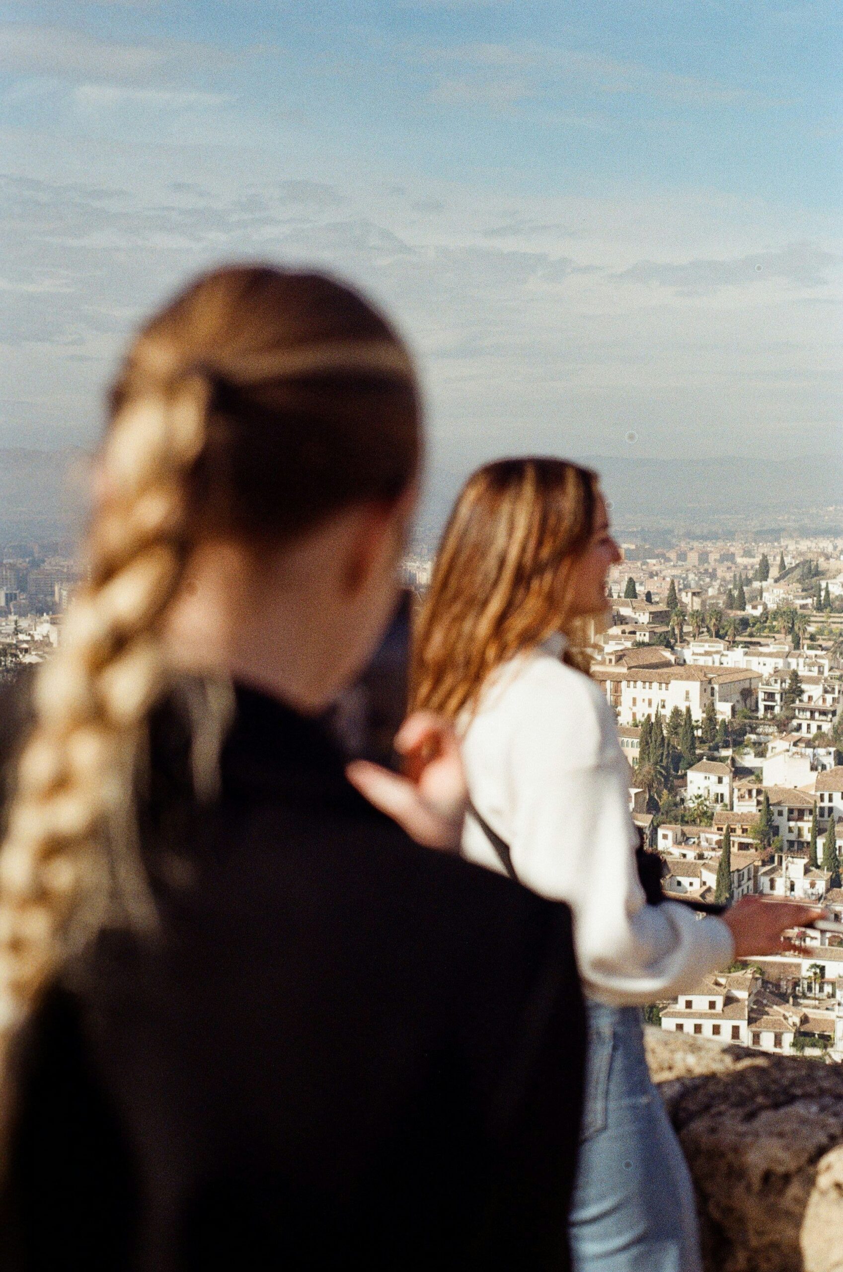 A couple of women standing next to each other